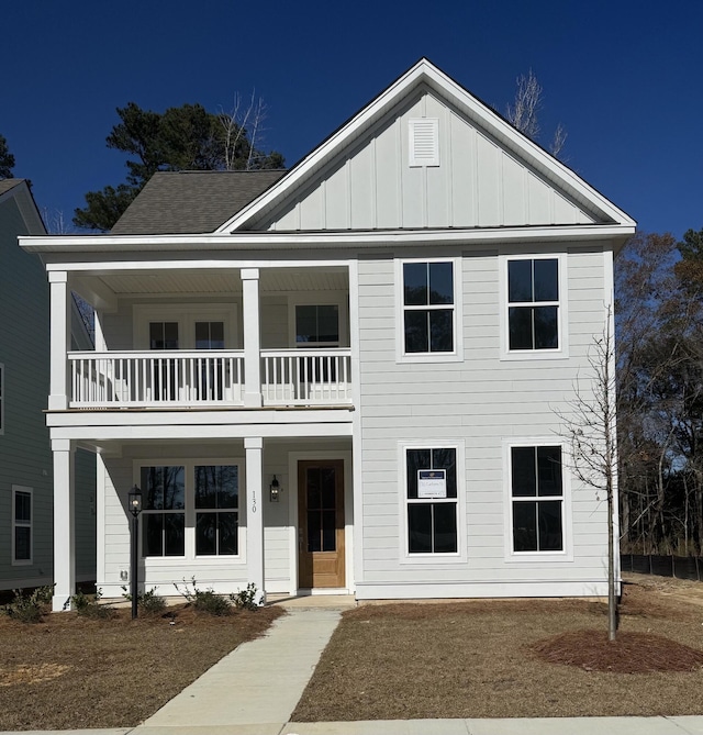 view of front of property with a balcony