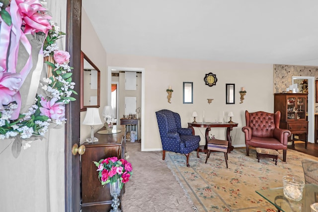 living area with carpet