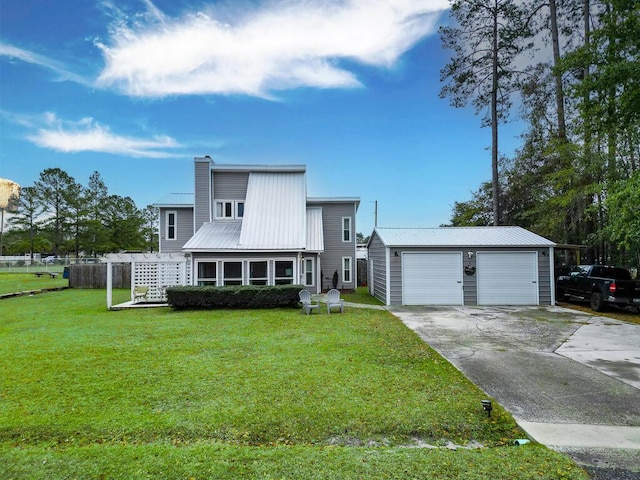 49 Auld Brass Rd, Walterboro, SC 29488 - view of front facade with a garage, metal roof, a front lawn, an outbuilding, and a chimney