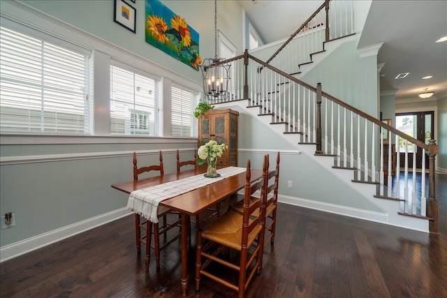 dining area with wood finished floors, baseboards, and a wealth of natural light