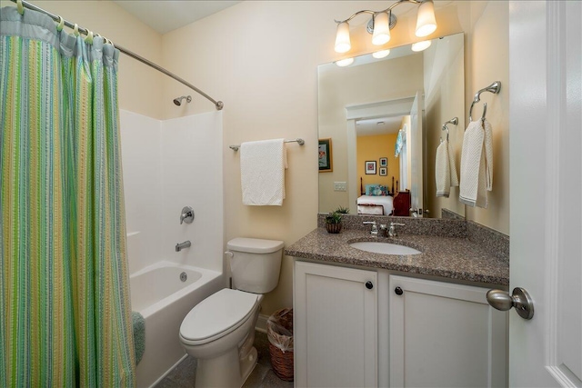 full bathroom featuring toilet, vanity, and shower / bath combo