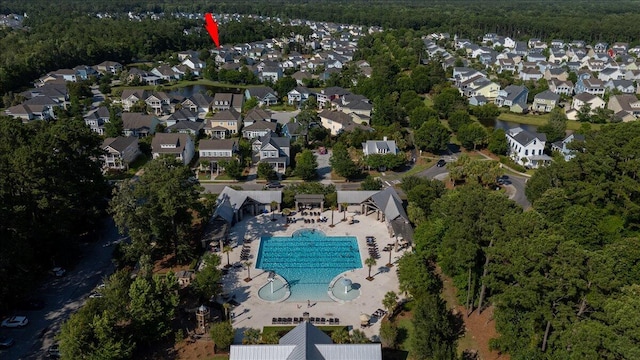 bird's eye view featuring a residential view and a water view