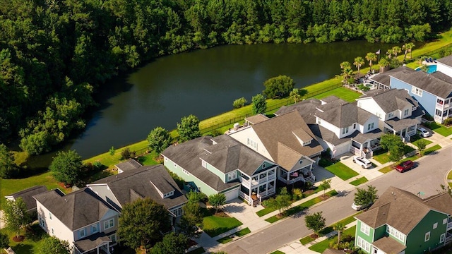 aerial view with a residential view and a water view