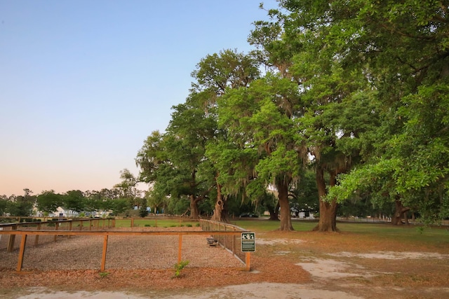 surrounding community featuring fence