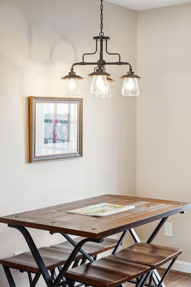 dining space featuring hardwood / wood-style floors