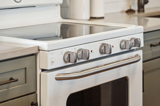 room details with white electric range oven