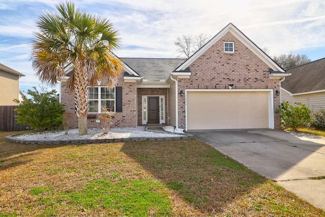 view of front of property featuring concrete driveway, brick siding, an attached garage, and a front yard