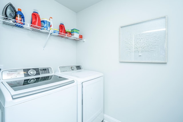 laundry room with washer and dryer