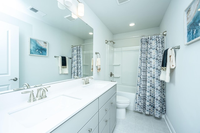 full bathroom featuring tile patterned flooring, shower / bath combo, vanity, and toilet