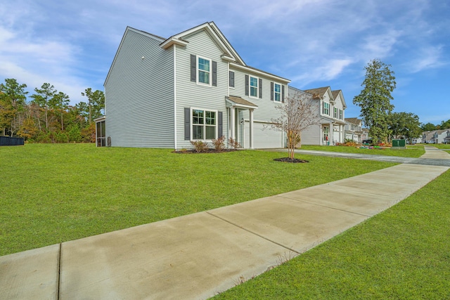 view of front of home featuring a garage and a front yard