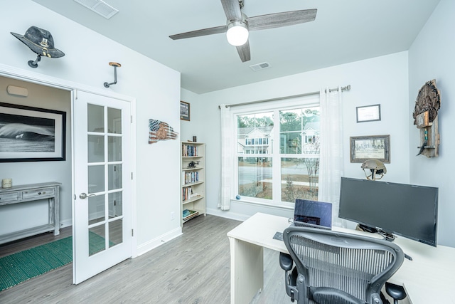 office space with french doors, light wood-type flooring, and ceiling fan