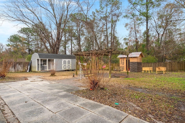 view of front of property with a shed