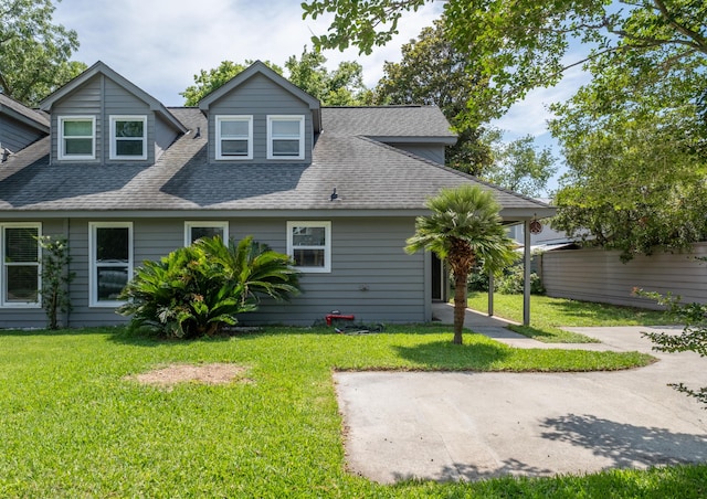 1485 Kinloch Ln, Mount Pleasant, SC 29464 - back of house with roof with shingles, a lawn, and a patio