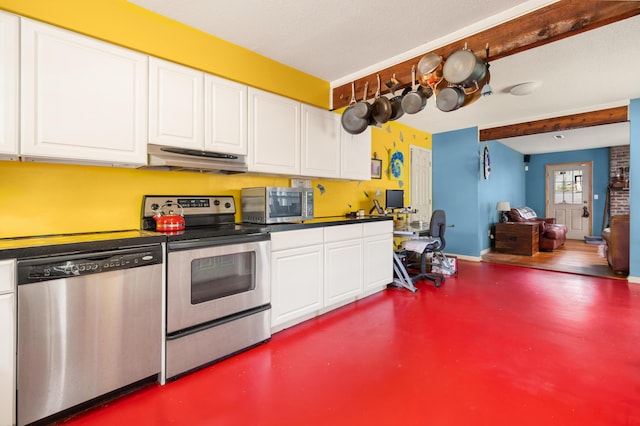 1485 Kinloch Ln, Mount Pleasant, SC 29464 - kitchen with stainless steel appliances, under cabinet range hood, white cabinetry, concrete flooring, and dark countertops