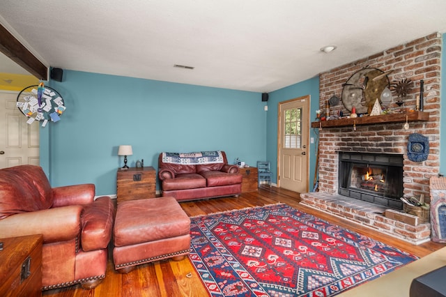 1485 Kinloch Ln, Mount Pleasant, SC 29464 - living area featuring hardwood / wood-style floors and a brick fireplace