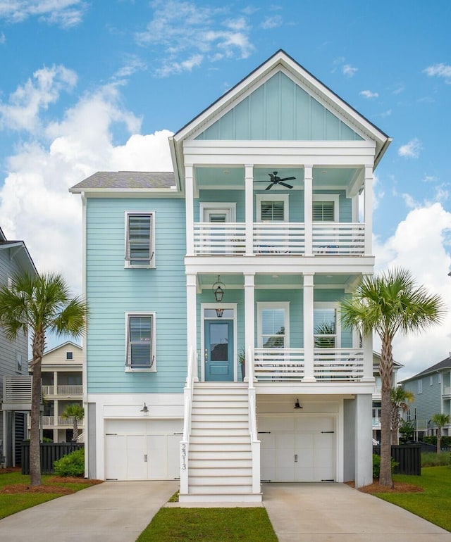 2313 Bucktail Ct, Mount Pleasant, SC 29466 - beach home with a balcony, driveway, a porch, and an attached garage