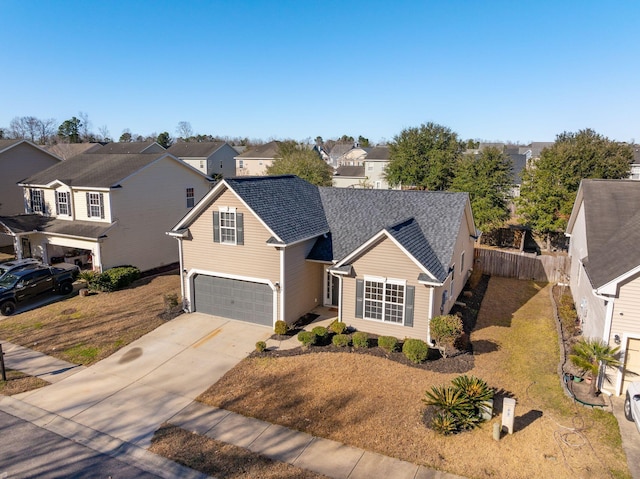 front of property with a garage and a front lawn