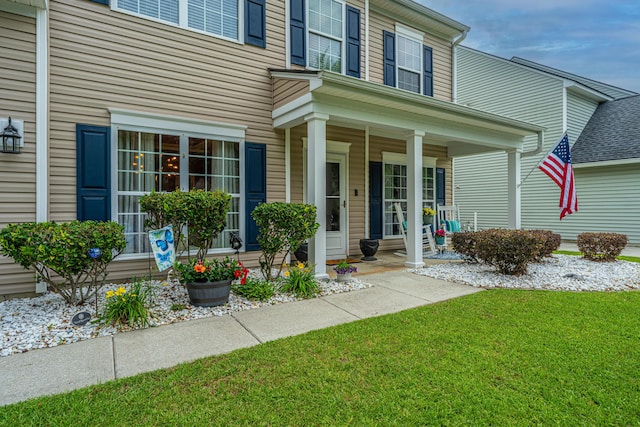 9636 Pebble Creek Blvd, Summerville, SC 29485 - view of exterior entry with a porch and a yard