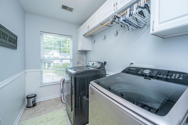 9636 Pebble Creek Blvd, Summerville, SC 29485 - laundry area with cabinet space, separate washer and dryer, baseboards, and healthy amount of natural light