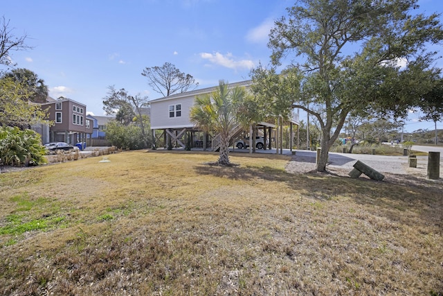 view of yard with a carport