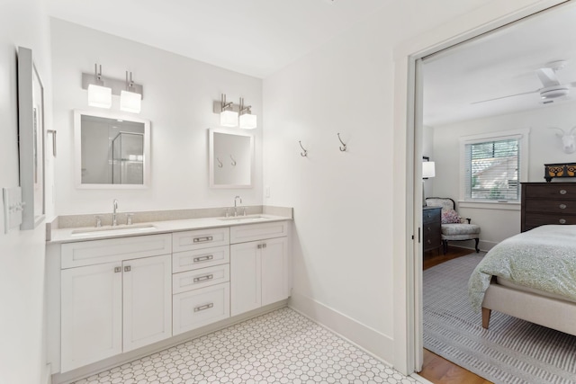 bathroom featuring vanity and ceiling fan