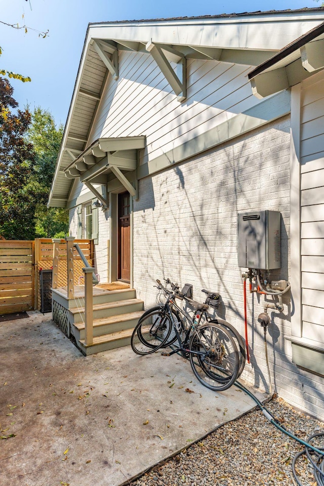 entrance to property with a patio