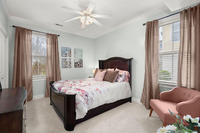 bedroom with crown molding, light colored carpet, visible vents, and baseboards