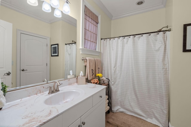 full bathroom featuring vanity, a shower with curtain, and ornamental molding