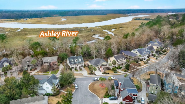 aerial view with a residential view and a water view