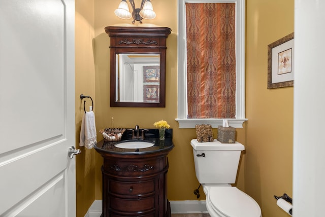 half bath with toilet and vanity