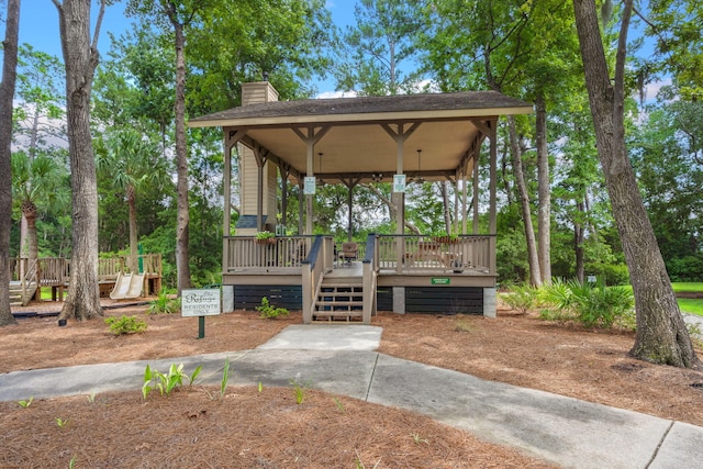 exterior space featuring a wooden deck