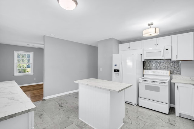 kitchen featuring white cabinets, backsplash, white appliances, and a center island