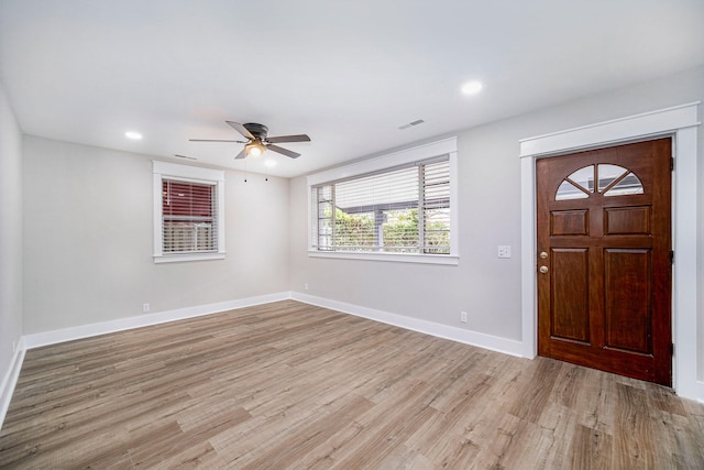 entryway with baseboards, ceiling fan, recessed lighting, and light wood-style flooring