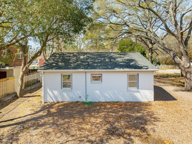 view of outdoor structure with fence
