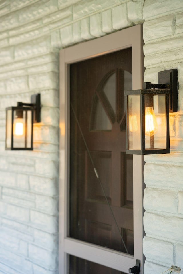 entrance to property with stone siding