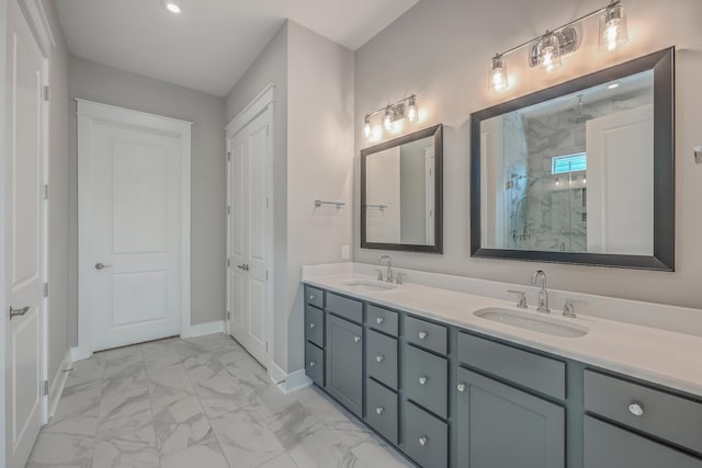 bathroom featuring vanity and a shower