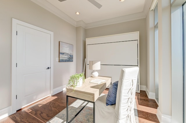 home office with hardwood / wood-style flooring and ornamental molding