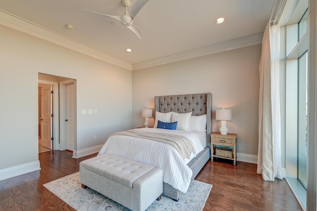 bedroom with ornamental molding, ceiling fan, and dark wood-type flooring