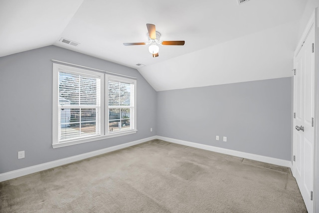 bonus room with carpet floors, visible vents, and baseboards