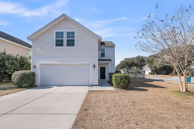 traditional home with driveway and an attached garage