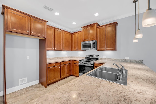 kitchen featuring visible vents, brown cabinets, stainless steel appliances, light countertops, and a sink