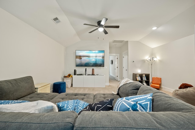 living room with lofted ceiling, light carpet, and ceiling fan