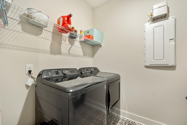 laundry room with separate washer and dryer