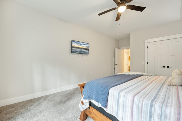 bedroom featuring carpet, a closet, and ceiling fan