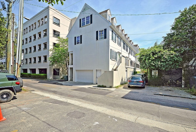 view of building exterior with an attached garage