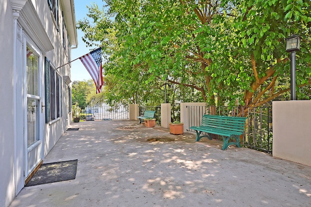 view of patio / terrace featuring fence