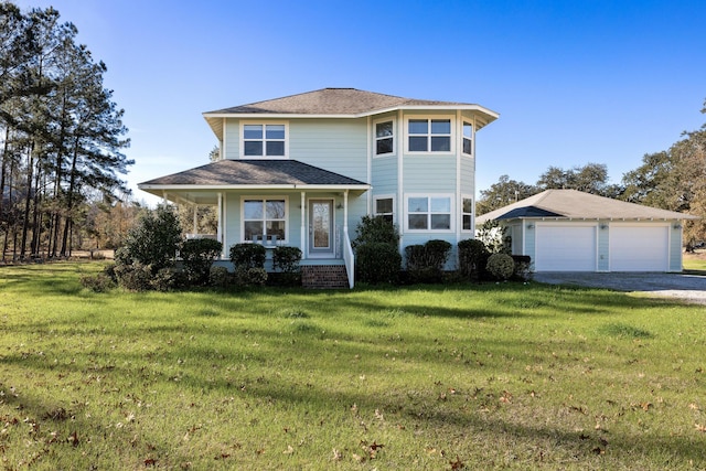 front facade with covered porch and a front yard