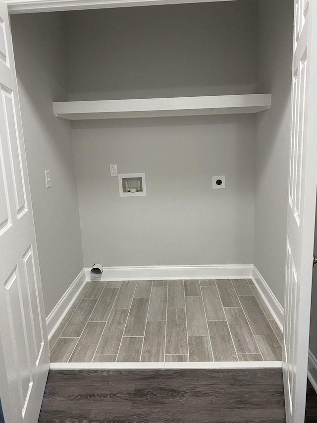 217 Middleton St, Eutawville, SC 29048 - laundry area featuring wood finish floors, hookup for a washing machine, electric dryer hookup, laundry area, and baseboards