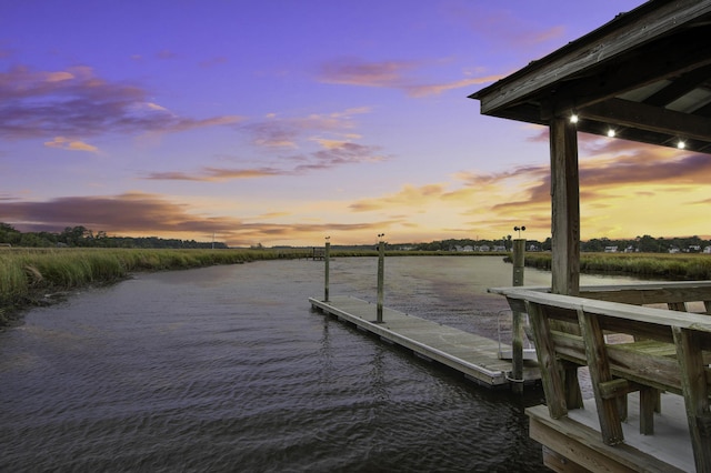 dock area featuring a water view