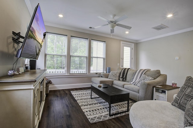 living room with dark wood-style floors, ceiling fan, crown molding, and visible vents